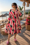 Robe midi fluide imprimée graphique – Élégance estivale